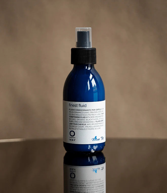 Oway Blue-Tit-Finest Fluid Previously Superfluid 4.7oz. Blue bottle, white lable, blue letters, black tap spray. Available at Ippodaro Natural Salon, San Antonio, TX